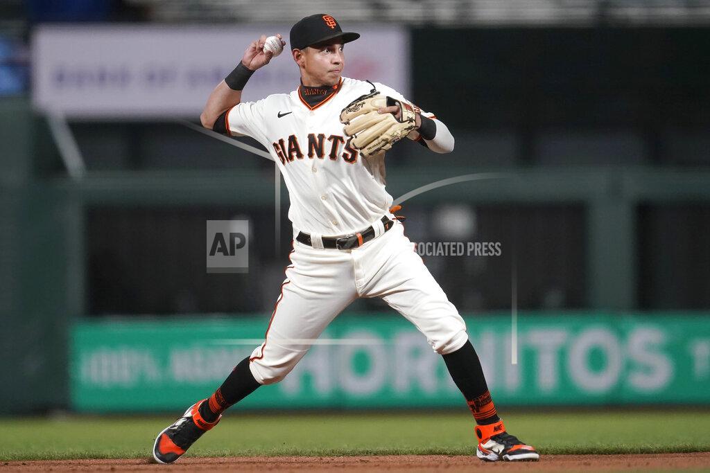 Jeff Chiu San Francisco Giants shortstop Mauricio Dubon throws out Colorado Rockies' Yonathan Daza during the fifth inning of a baseball game in San Francisco, Monday, April 26, 2021. (AP Photo/Jeff Chiu)