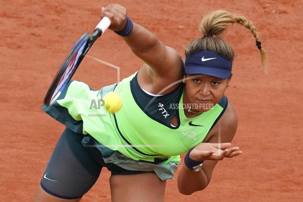 Christophe Ena Japan's Naomi Osaka serves against Amanda Anisimova of the U.S. during their first round match at the French Open tennis tournament in Roland Garros stadium in Paris, France, Monday, May 23, 2022. (AP Photo/Christophe Ena)