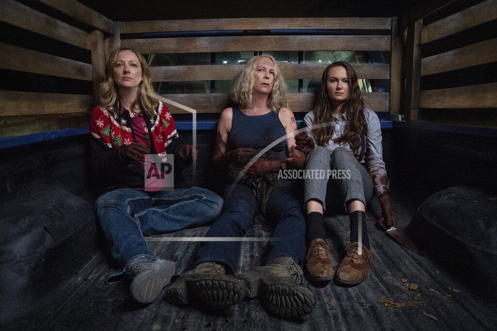 Ryan Green This image released by Universal Pictures shows Judy Greer, from left, Jamie Lee Curtis and Andi Matichak in "Halloween Kills," directed by David Gordon Green. (Ryan Green/Universal Pictures via AP)