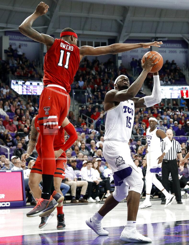 Tony Gutierrez Texas Tech forward Tariq Owens (11) goes up to block a shot attempt by TCU forward JD Miller (15) in the second half of an NCAA college basketball game in Fort Worth, Texas, Saturday, March 2, 2019. (AP Photo/Tony Gutierrez)