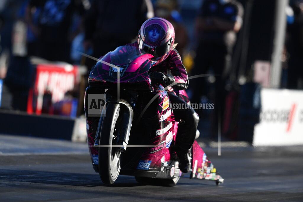 Jerry Foss In this photo provided by the NHRA, Pro Stock Motorcycle's Angie Smith raced to her first win since 2014 in the final round at The Strip at Las Vegas Motor Speedway thanks to her run of 6.917 seconds at 194.83 mph, Sunday, Nov. 1, 2020, in Las Vegas. (Jerry Foss/NHRA via AP)