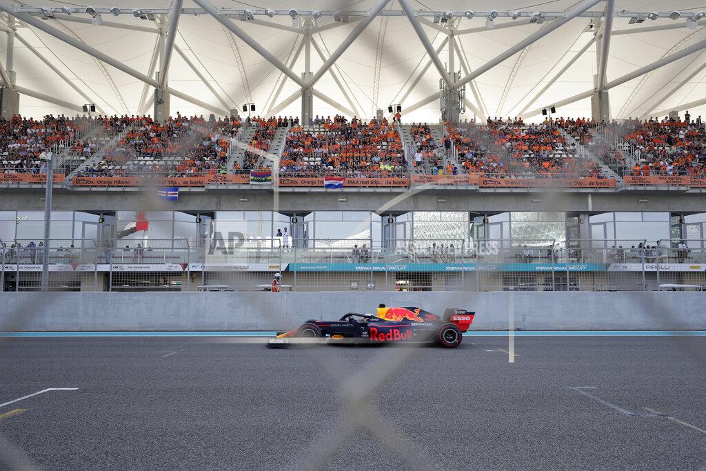Hassan Ammar Red Bull driver Max Verstappen of the Netherland's steers his car during the third free practice at the Yas Marina racetrack in Abu Dhabi, United Arab Emirates, Saturday, Nov. 30, 2019. The Emirates Formula One Grand Prix will take place on Sunday. (AP Photo/Hassan Ammar)