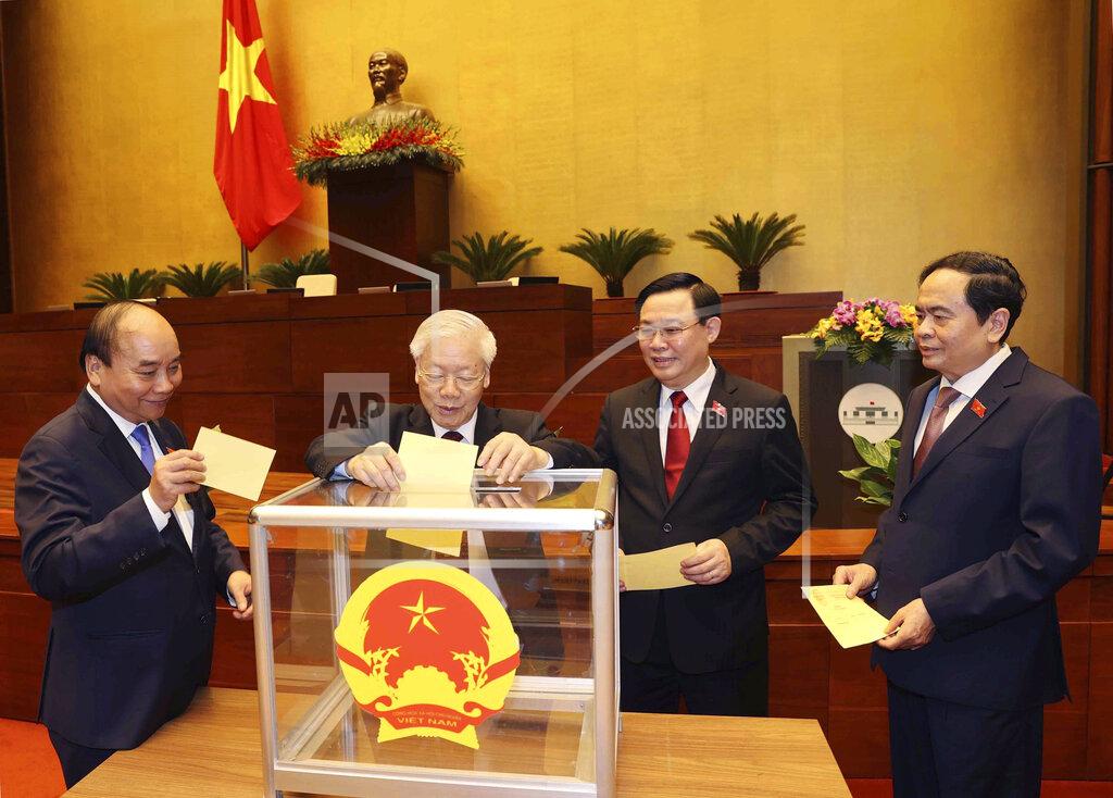 Nguyen Phuong Hoa Vietnamese leaders cast ballot to elect new Prime Minister, from left, President Nguyen Xuan Phuc, Communist General Secretary Nguyen Phu Trong, Chairman of National Assembly Vuong Dinh Hue and newly elected Prime Minister Pham Minh Chinh in Hanoi, Vietnam on Monday, April 5, 2021. Vietnam's legislature voted Monday to make Pham Minh Chinh, a member of the Communist party's central committee for personnel and organization, the country's next prime minister. Outgoing Prime Minister Nguyen Xuan Phuc was appointed the new president.(Nguyen Phuong Hoa/VNA via AP)
