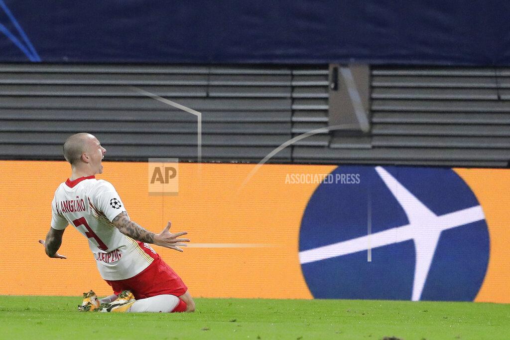 Markus Schreiber Leipzig's Angelino celebrates after scoring his side's opening goal during a Group H Champions League soccer match between RB Leipzig and Istanbul Basaksehir at the RB Arena in Leipzig, Germany, Tuesday Oct. 20, 2020. (AP Photo/Markus Schreiber)
