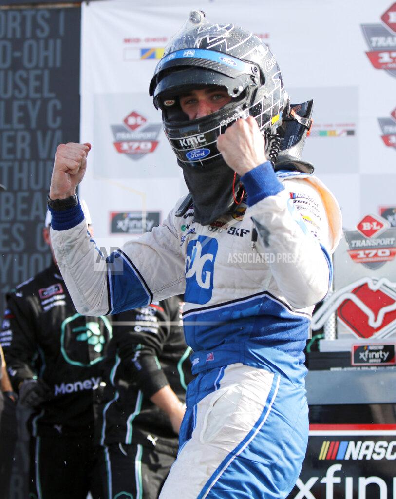 Tom E. Puskar Austin Cindric celebrates his win in the NASCAR Xfinity Series auto race Saturday, Aug. 10, 2019, at Mid-Ohio Sports Car Course in Lexington, Ohio. (AP Photo/Tom E. Puskar)