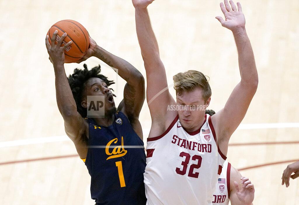 Tony Avelar California guard Joel Brown (1) is fouled by Stanford forward Lukas Kisunas (32) during the second half of an NCAA college basketball game in Stanford, Calif., Sunday, Feb. 7, 2021. (AP Photo/Tony Avelar)