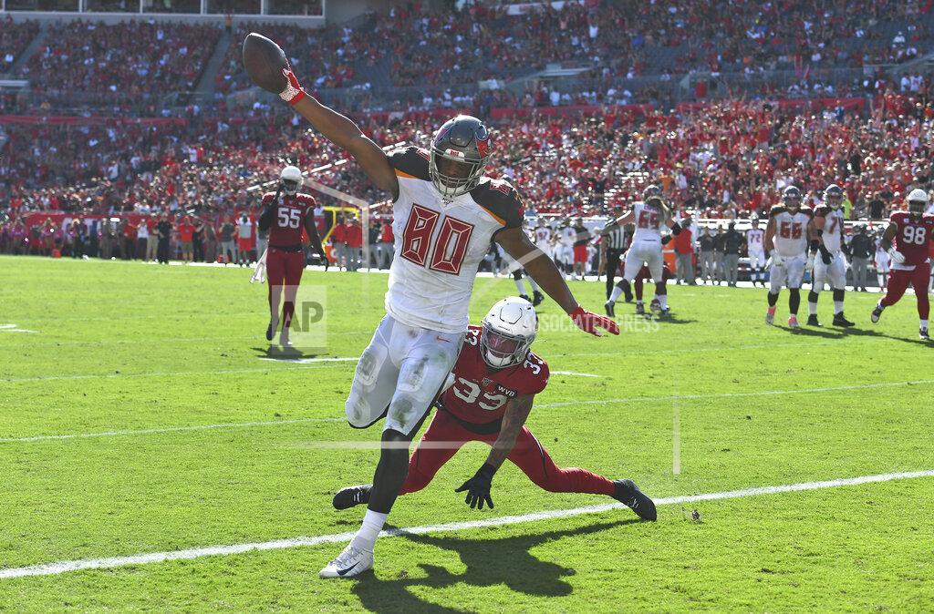Jason Behnken Tampa Bay Buccaneers tight end O.J. Howard (80) scores past Arizona Cardinals cornerback Byron Murphy (33) on a 10-yard touchdown reception during the first half of an NFL football game Sunday, Nov. 10, 2019, in Tampa, Fla. (AP Photo/Jason Behnken)