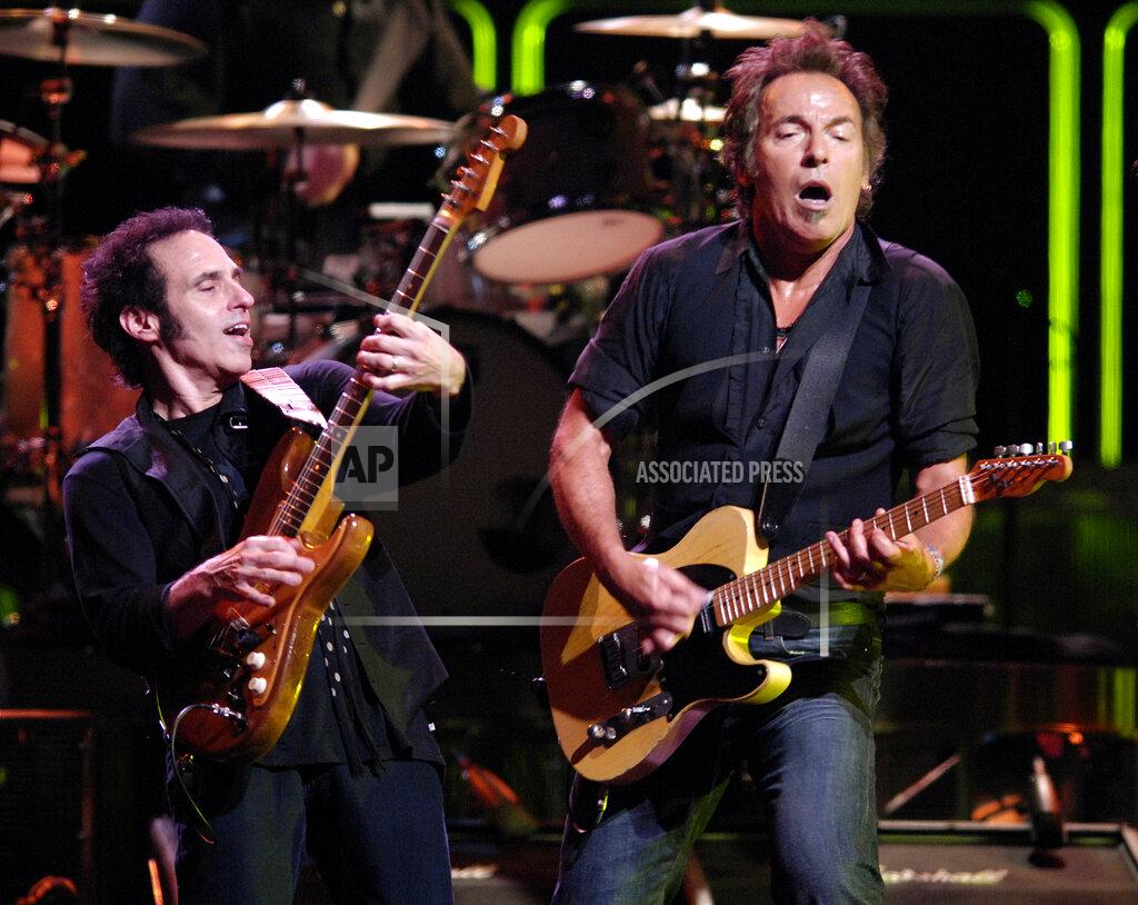 Chris Pizzello FILE - Bruce Springsteen, right, and Nils Lofgren of the E Street Band perform during their concert at the Los Angeles Sports Arena on Oct. 29, 2007. Springsteen's latest album, "Letter To You" will be released on Oct. 23. (AP Photo/Chris Pizzello, File)