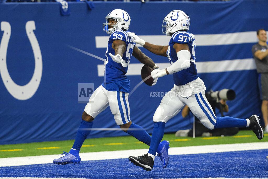 Aj Mast Indianapolis Colts outside linebacker Darius Leonard (53) celebrates an interception with defensive tackle Al-Quadin Muhammad (97) during the second half of an NFL football game against the Miami Dolphin in Indianapolis, Sunday, Nov. 10, 2019. (AP Photo/AJ Mast)
