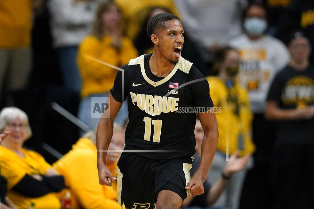 Charlie Neibergall Purdue guard Isaiah Thompson (11) celebrates after making a 3-point basket during the second half of an NCAA college basketball game against Iowa, Thursday, Jan. 27, 2022, in Iowa City, Iowa. (AP Photo/Charlie Neibergall)