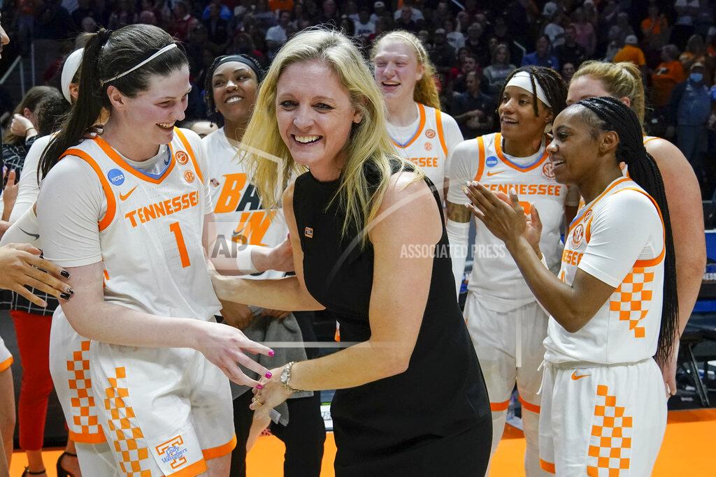 Mark Humphrey Tennessee head coach Kellie Harper celebrates with Sara Puckett (1) after Tennessee beat Belmont in a women's college basketball game in the second round of the NCAA tournament Monday, March 21, 2022, in Knoxville, Tenn. (AP Photo/Mark Humphrey)