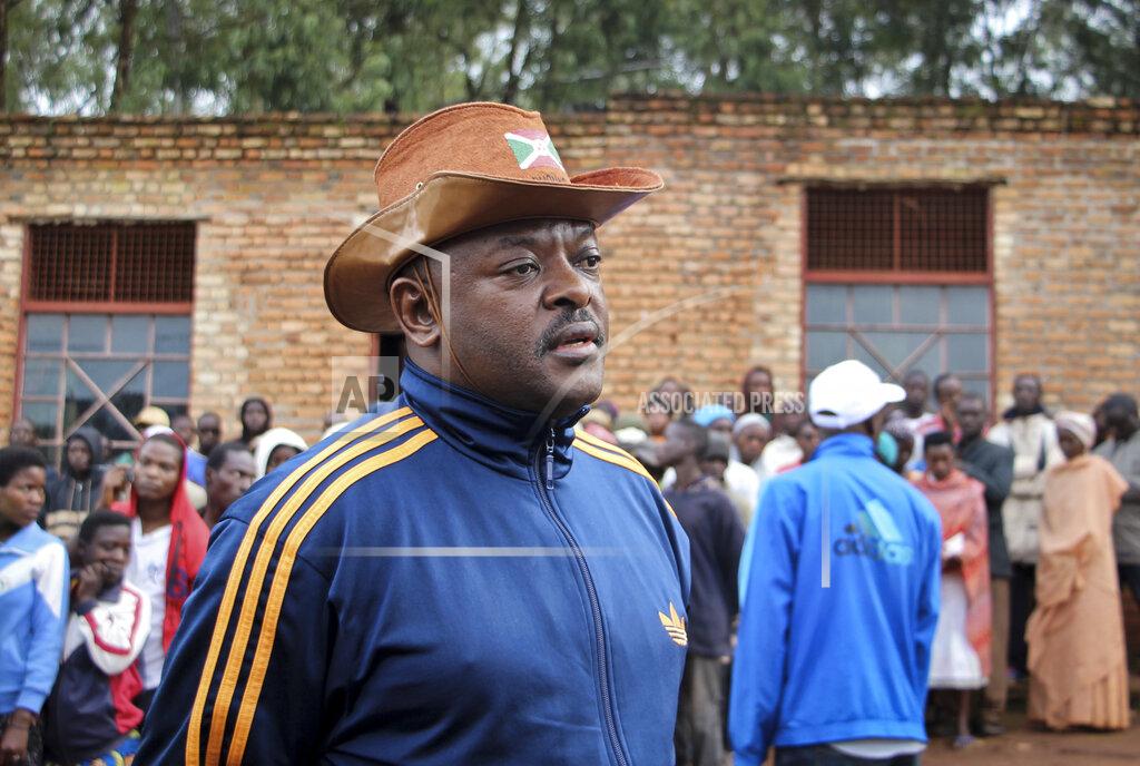 FILE - In this Thursday, May 17, 2018 file photo, Burundi's President Pierre Nkurunziza speaks to the media after casting his vote in the constitutional referendum in Buye, northern Burundi. Burundi's government said Tuesday, June 9, 2020, that President Pierre Nkurunziza has died of a heart attack. (AP Photo/Berthier Mugiraneza, File)
