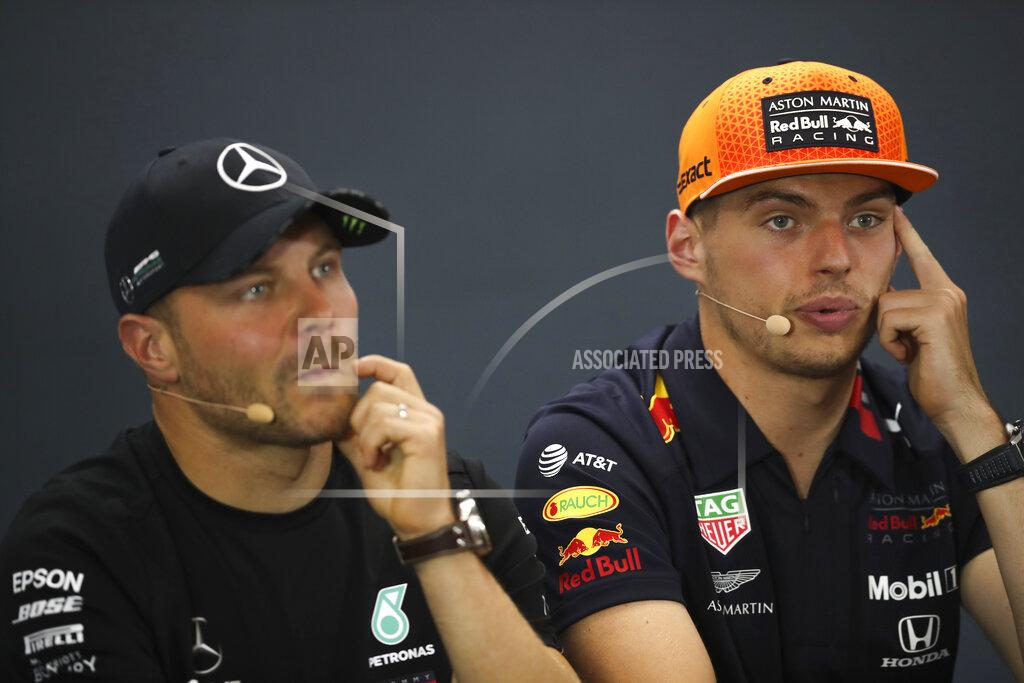 Francisco Seco Red Bull driver Max Verstappen of the Netherlands, right, talks to journalists next to Mercedes driver Valtteri Bottas of Finland prior a press conference ahead of the Belgian Formula One Grand Prix in Spa-Francorchamps, Belgium, Thursday, Aug. 29, 2019. The Belgian Formula One Grand Prix will take place on Sunday, Sept. 1, 2019. (AP Photo/Francisco Seco)