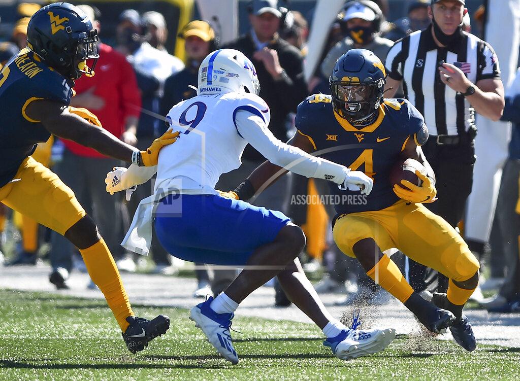 William Wotring West Virginia running back Leddie Brown (4) rushes the ball against Kansas during an NCAA college football game, Saturday, Oct. 17, 2020, in Morgantown, W.Va. (William Wotring/The Dominion-Post via AP)