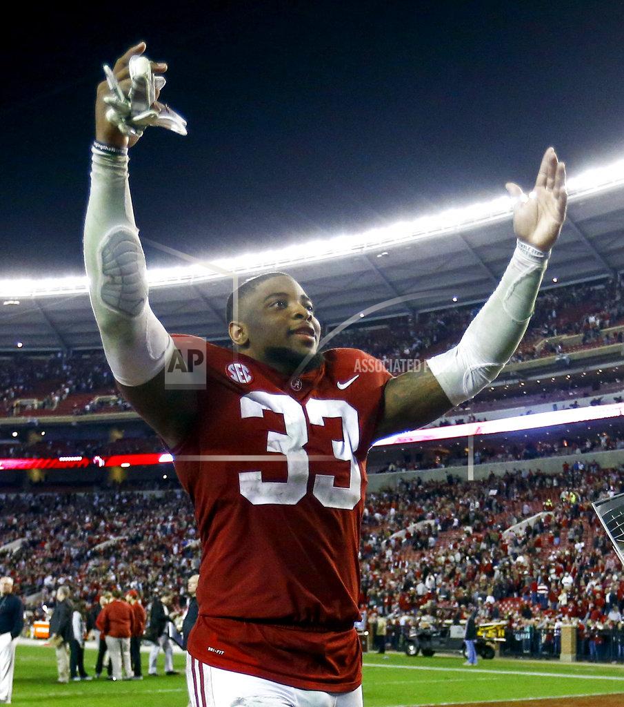 Butch Dill Alabama linebacker Anfernee Jennings waves to fans as he runs off the field after Alabama's 52-21 win over Auburn in an NCAA college football game Saturday, Nov. 24, 2018, in Tuscaloosa, Ala. (AP Photo/Butch Dill)