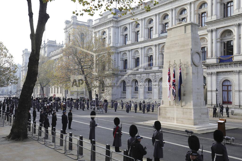 Aaron Chown Representatives of the armed forces wait for the start of the Remembrance Sunday service at the Cenotaph, in Whitehall, London, Sunday Nov. 8, 2020. (Aaron Chown, Pool Photo via AP)