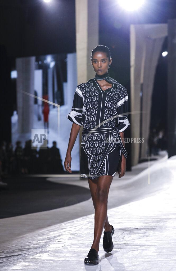 Vianney Le Caer A model wears a creation for the Hermes Spring-Summer 2021 fashion collection, Saturday, Oct. 3, 2020, during Paris fashion week. (Photo by Vianney Le Caer/Invision/AP)