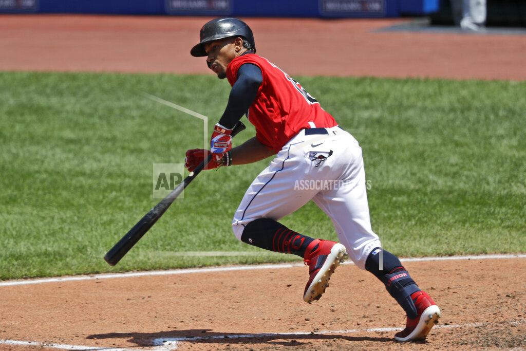 Tony Dejak Cleveland Indians' Francisco Lindor watches his ball after hitting a one run double in the third inning in a baseball game against the Kansas City Royals, Sunday, July 26, 2020, in Cleveland. (AP Photo/Tony Dejak)