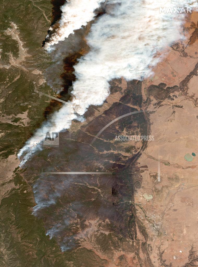 Uncredited This satellite image provided by Maxar Technologies shows an overview of the Hermits Peak wildfire, in Las Vegas, New Mexico, on Wednesday, May 11, 2022. Wildfire in the West is on a furious pace early this year. Wind-driven flames tearing through vegetation that is extraordinarily dry from years-long drought exacerbated by climate change has made even small blazes a threat to life and property. (Satellite image ©2022 Maxar Technologies via AP)