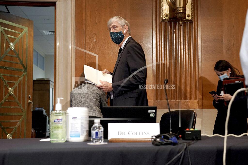 Greg Nash Dr. Francis Collins, Director of the National Institutes of Health, arrives for a Senate Health, Education, Labor and Pensions Committee hearing to discuss vaccines and protecting public health during the coronavirus pandemic on Capitol Hill, Wednesday, Sept. 9, 2020, in Washington. (Greg Nash/Pool via AP)
