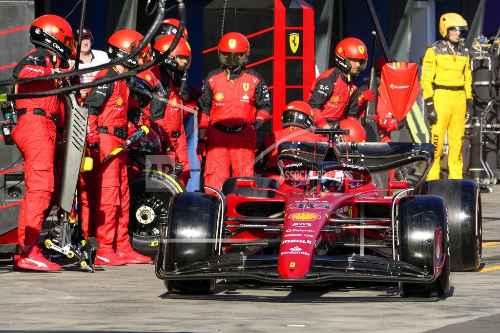 Simon Baker Ferrari driver Charles Leclerc of Monaco steers his car out of pit lane after a tire change during the Australian Formula One Grand Prix in Melbourne, Australia, Sunday, April 10, 2022. (Simon Baker, Pool via AP)