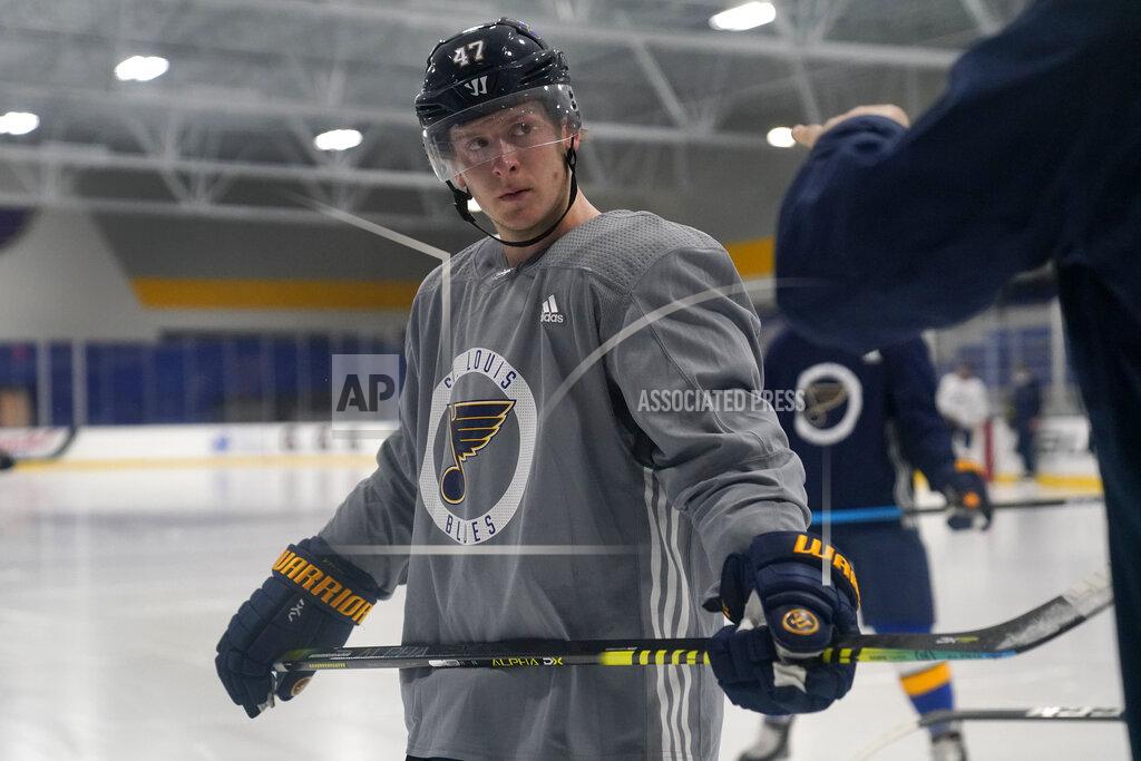 Jeff Roberson St. Louis Blues' Torey Krug listens to a member of the coaching staff during NHL hockey training camp Tuesday, Jan. 5, 2021, in Maryland Heights, Mo. (AP Photo/Jeff Roberson)