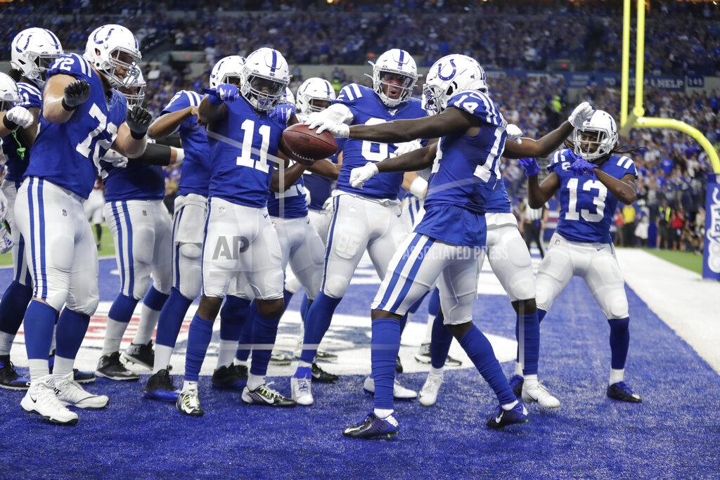 Michael Conroy Indianapolis Colts wide receiver Zach Pascal (14) celebrates after making a touchdown reception during the first half of an NFL football game against the Atlanta Falcons, Sunday, Sept. 22, 2019, in Indianapolis. (AP Photo/Michael Conroy)