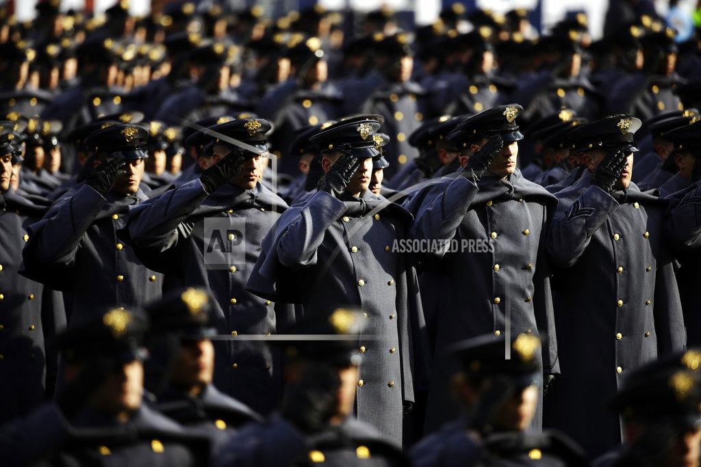 Matt Rourke Army Cadets salute ahead of an NCAA college football against Navy, Saturday, Dec. 8, 2018, in Philadelphia. (AP Photo/Matt Rourke)