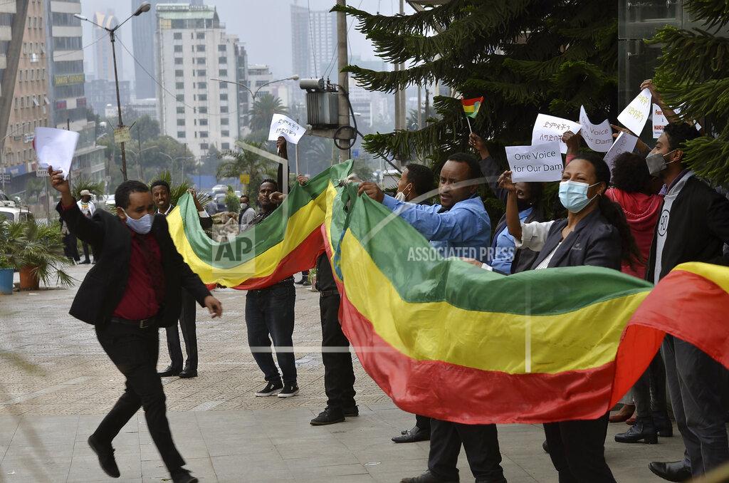 Samuel Habtab FILE - In this Sunday, Aug. 2, 2020 file photo, Ethiopians celebrate the progress made on the Nile dam, in Addis Ababa, Ethiopia. President Donald Trump has largely neglected Africa, with one glaring exception: the tussle between two of the continent's most powerful countries, Ethiopia and Egypt, over a massive dam project on a tributary of the Nile. (AP Photo/Samuel Habtab, File)