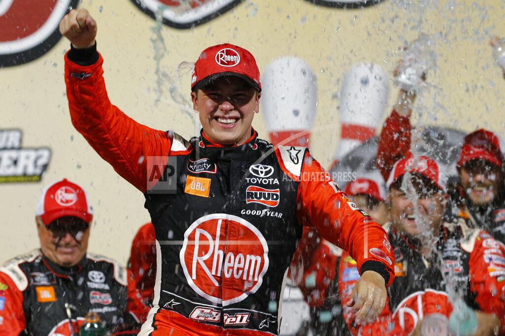 Steve Helber Christopher Bell celebrates his win in the NASCAR Xfinity Series auto race in Victory Lane at Richmond Raceway in Richmond, Va., Friday, Sept. 20, 2019. (AP Photo/Steve Helber)