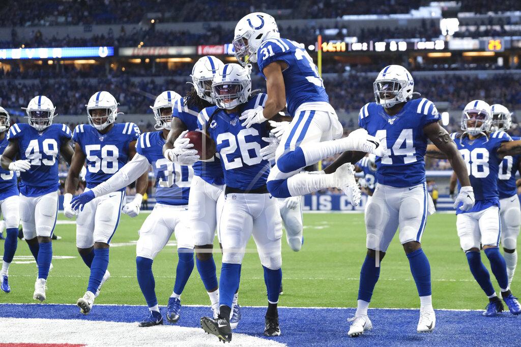 Aj Mast Indianapolis Colts strong safety Clayton Geathers (26) celebrates with cornerback Quincy Wilson (31) after Geathers made in interception during the first half of an NFL football game against the Atlanta Falcons, Sunday, Sept. 22, 2019, in Indianapolis. (AP Photo/AJ Mast)