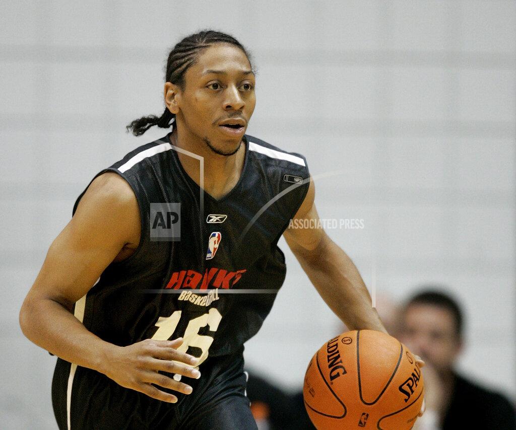 Douglas C. Pizac FILE - In this July 14, 2006, file photo, Atlanta Hawks guard Anthony Grundy plays during the Rocky Mountain Review summer league basketball game hosted by the Utah Jazz in Taylorsville, Utah. Grundy, also former North Carolina State basketball player, died Thursday, Nov. 14, 2019, from stab wounds suffered as the result of a domestic dispute in Kentucky, authorities said. (AP Photo/Douglas C. Pizac, File)