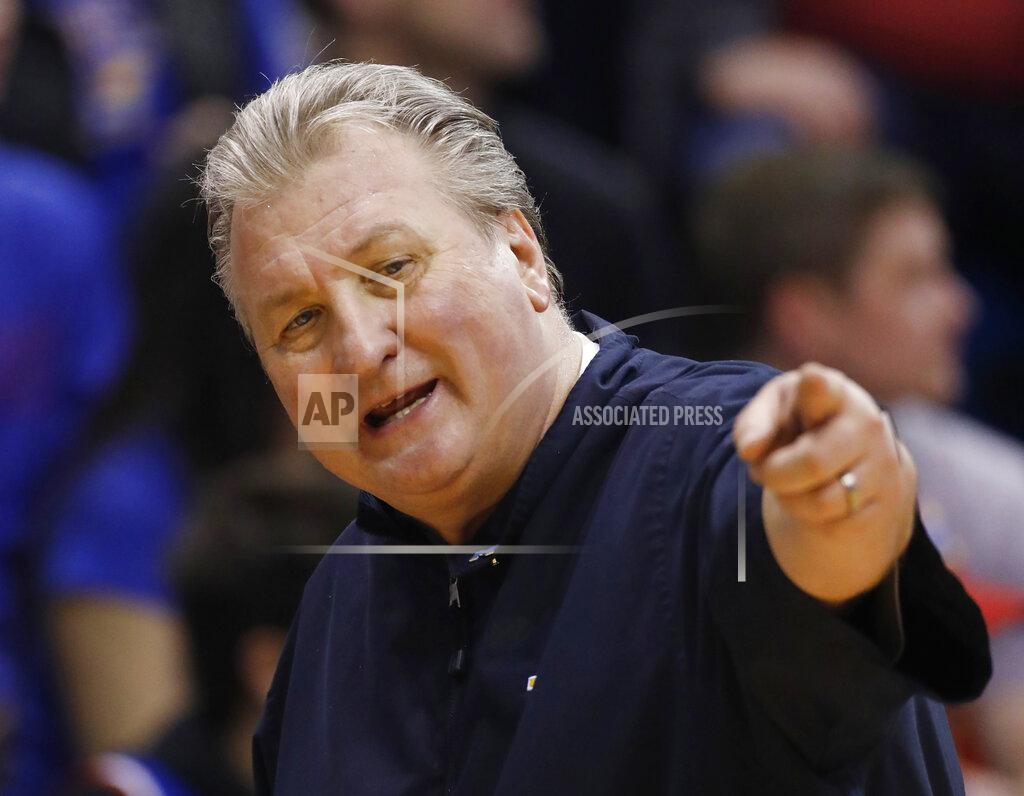 Colin E. Braley West Virginia coach Bob Huggins reacts during the second half of the team's NCAA college basketball game against Kansas, Saturday, Feb. 16, 2019, in Lawrence, Kan. (AP Photo/Colin E. Braley)