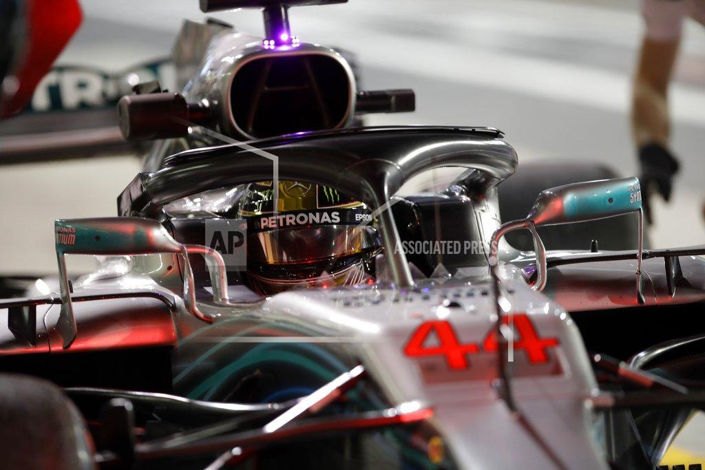 Luca Bruno Mercedes driver Lewis Hamilton of Britain steers his car during the second free practice at the Yas Marina racetrack in Abu Dhabi, United Arab Emirates, Friday Nov. 23, 2018. The Emirates Formula One Grand Prix will take place on Sunday. (AP Photo/Luca Bruno)
