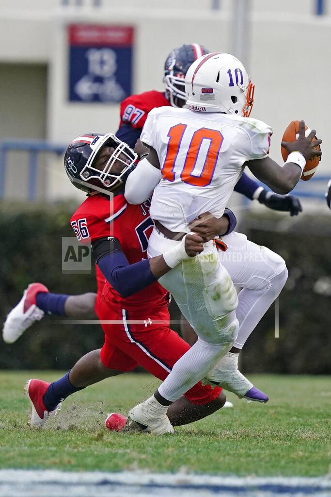 Rogelio V. Solis Jackson State linebacker Keith Lopez (56) sacks Edward Waters quarterback Roshard Branch (10) during the second half of an NCAA college football game in Jackson, Miss., Sunday, Feb. 21, 2021. (AP Photo/Rogelio V. Solis)