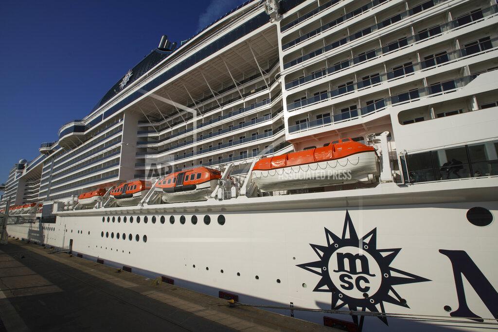 Andrew Medichini A view of the MSC Grandiosa cruise ship in Civitavecchia, near Rome, Wednesday, March 31, 2021. MSC Grandiosa, the world's only cruise ship to be operating at the moment, left from Genoa on March 30 and stopped in Civitavecchia near Rome to pick up more passengers and then sail toward Naples, Cagliari, and Malta to be back in Genoa on April 6. For most of the winter, the MSC Grandiosa has been a lonely flag-bearer of the global cruise industry stalled by the pandemic, plying the Mediterranean Sea with seven-night cruises along Italy’s western coast, its major islands and a stop in Malta. (AP Photo/Andrew Medichini)