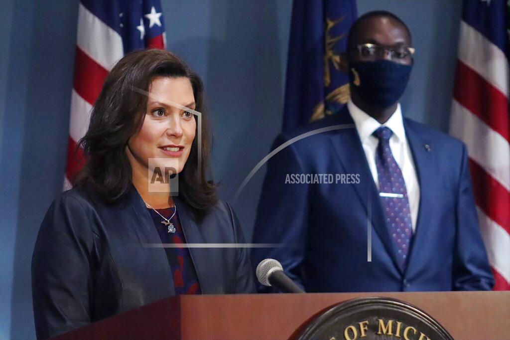 Uncredited FILE - In this Wednesday, Sept. 2, 2020 file photo provided by the Michigan Office of the Governor, Gov. Gretchen Whitmer addresses the state during a speech in Lansing, Mich. Whitmer said Monday, Oct. 5, 2020, that a statewide mask requirement remains in effect despite the Michigan Supreme Court's invalidation of a law that underpins her orders to control the coronavirus pandemic. (Michigan Office of the Governor via AP, File)