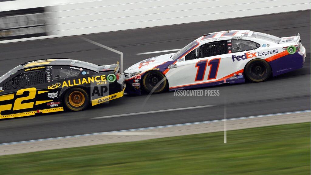 Charles Krupa Drivers Brad Keselowski (2) and Denny Hamlin (11) race bumper-to-bumper during a NASCAR Cup Series auto race, Sunday, Aug. 2, 2020, at the New Hampshire Motor Speedway in Loudon, N.H. (AP Photo/Charles Krupa)
