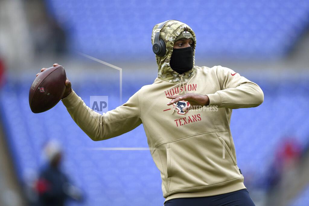 Gail Burton Houston Texans quarterback Deshaun Watson is bundled up while working out prior to an NFL football game against the Baltimore Ravens, Sunday, Nov. 17, 2019, in Baltimore. (AP Photo/Gail Burton)