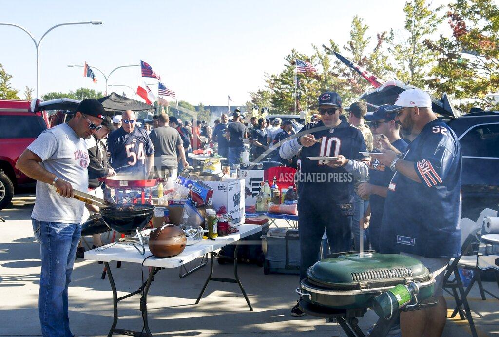 David Banks Fans tailgate outside Soldier Field before an NFL football game between the Green Bay Packers and the Chicago Bears Thursday, Sept. 5, 2019, in Chicago. (AP Photo/David Banks)