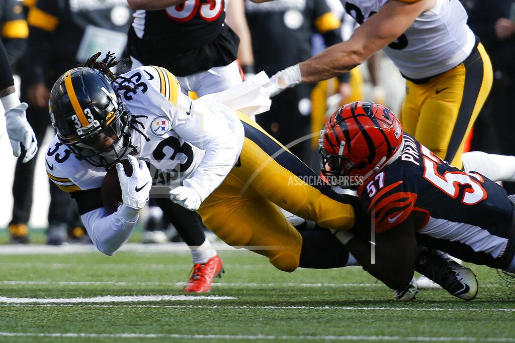 Frank Victores Pittsburgh Steelers running back Trey Edmunds (33) is tackled by Cincinnati Bengals linebacker Germaine Pratt (57) during the first half an NFL football game, Sunday, Nov. 24, 2019, in Cincinnati. (AP Photo/Frank Victores)