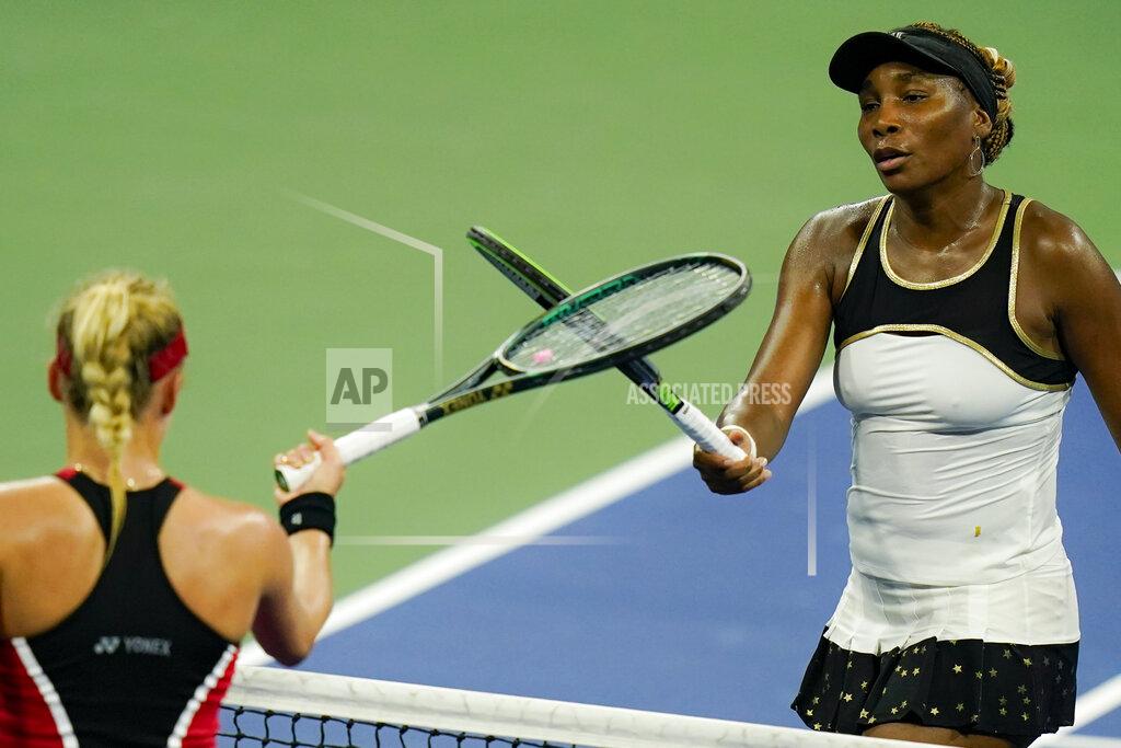 Frank Franklin Ii Venus Williams, of the United States, taps rackets with Dayana Yastremska, of Ukraine, after losing her match at the Western & Southern Open tennis tournament, Saturday, Aug. 22, 2020, in New York. (AP Photo/Frank Franklin II)