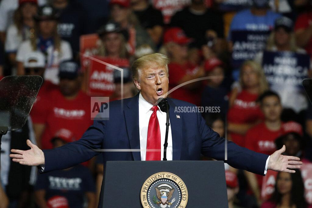FILE - In this June 20, 2020, file photo President Donald Trump speaks during a campaign rally in Tulsa, Okla., Saturday, June 20, 2020. Trump demoted his campaign manager, high-profile supporters are openly questioning his reelection message, and he risks losing the confidence of voters across the political spectrum because of his erratic leadership during the pandemic. (AP Photo/Sue Ogrocki, File)