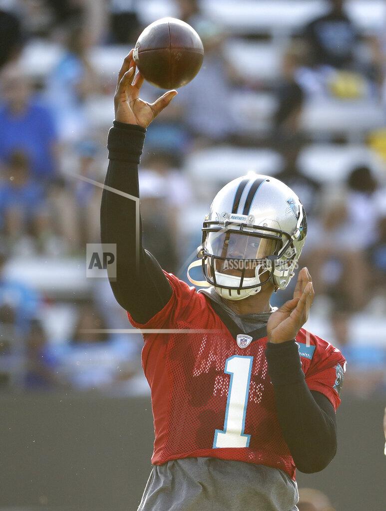 Chuck Burton Carolina Panthers quarterback Cam Newton throws a pass during practice at the NFL football team's training camp in Spartanburg, N.C., Thursday, July 25, 2019. (AP Photo/Chuck Burton)