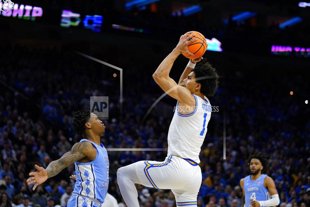 Matt Rourke UCLA's Jules Bernard (1) goes up for a shot against North Carolina's Caleb Love (2) during the first half of a college basketball game in the Sweet 16 round of the NCAA tournament, Friday, March 25, 2022, in Philadelphia. (AP Photo/Matt Rourke)