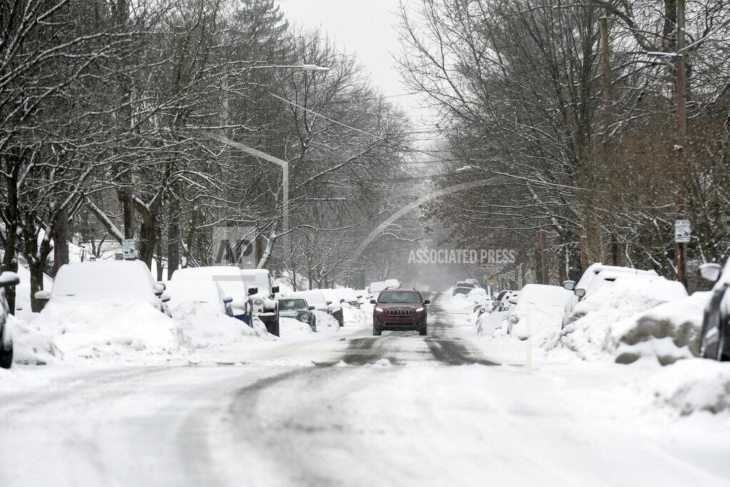 Jacqueline Dormer Snow blankets Mahantongo Street in Pottsville, Pa., on Sunday morning, Feb. 7, 2021. (Jacqueline Dormer/Republican-Herald via AP)