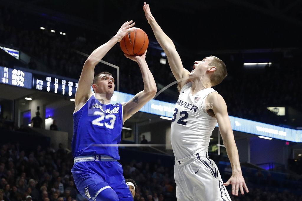 John Minchillo Seton Hall's Sandro Mamukelashvili (23) shoots against Xavier's Ryan Welage (32) during the second half of an NCAA college basketball game Wednesday, Jan. 2, 2019, in Cincinnati. (AP Photo/John Minchillo)