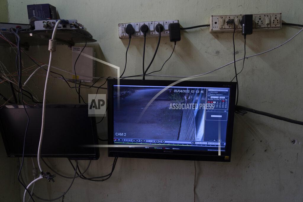 Rafiq Maqbool A screen with footage from a CCTV camera is seen at a local dairy farm in Aarey Colony, which borders the south end of Sanjay Gandhi National Park, in Mumbai, India, Tuesday, April 5, 2022. Los Angeles and Mumbai, India are the world’s only megacities of 10 million-plus where large felines breed, hunt and maintain territory within urban boundaries. Long-term studies in both cities have examined how the big cats prowl through their urban jungles, and how people can best live alongside them. (AP Photo/Rafiq Maqbool)