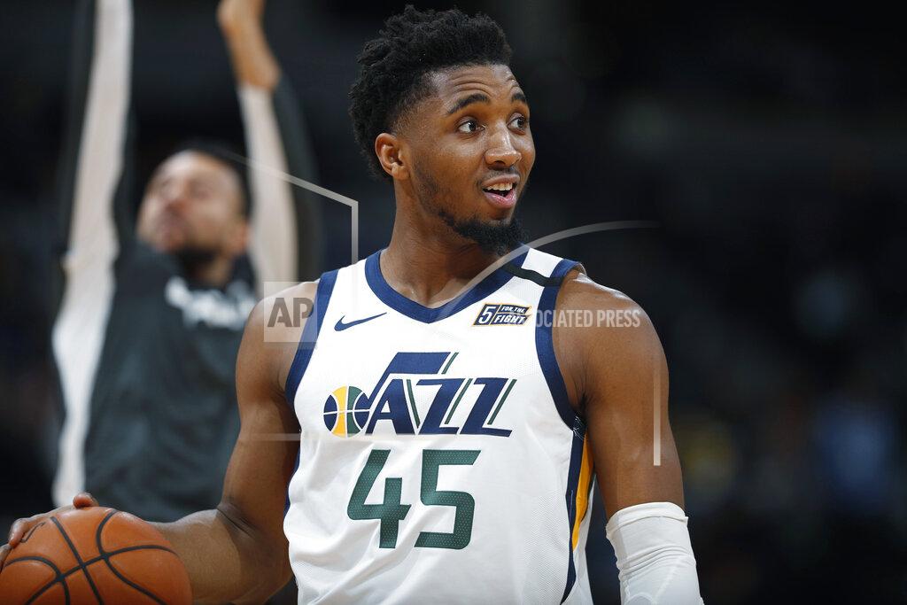 David Zalubowski FILE - In this Jan. 30, 2020, file photo, Utah Jazz guard Donovan Mitchell looks to the bench for direction in the second half of an NBA basketball game against the Denver Nuggets in Denver. (AP Photo/David Zalubowski, File)