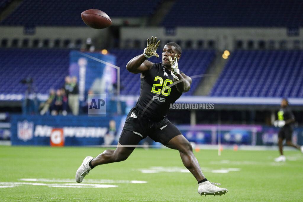 Michael Conroy Arizona running back J J Taylor runs a drill at the NFL football scouting combine in Indianapolis, Friday, Feb. 28, 2020. (AP Photo/Michael Conroy)